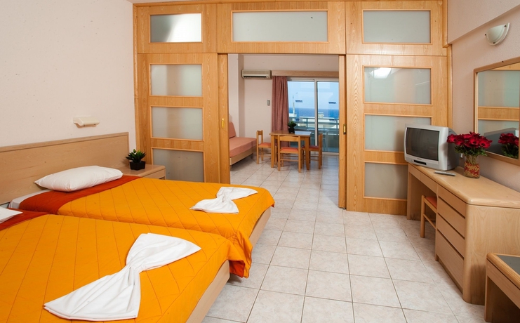 Imagen de la habitación del Hotel Poseidonia Apartments. Foto 8