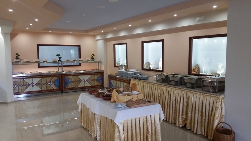 Imagen del bar/restaurante del Hotel Poseidonia Apartments. Foto 6