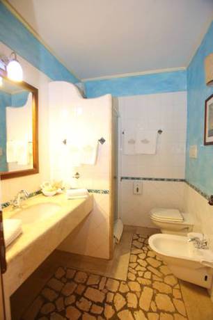 Imagen de la habitación del Hotel Poseidonia. Foto 10