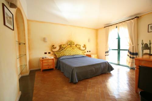 Imagen de la habitación del Hotel Poseidonia. Foto 11