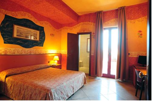Imagen de la habitación del Hotel Poseidonia Mare. Foto 15