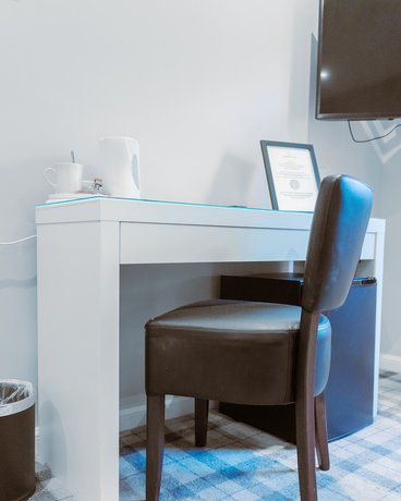 Imagen de la habitación del Hotel Poseidon's Inn. Foto 6