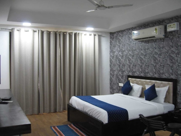 Imagen de la habitación del Hotel Posh Classic, sector 45, millenium city centre, gurugram. Foto 1