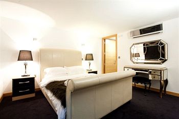 Imagen de la habitación del Hotel Posh Pads At The Casartelli. Foto 5