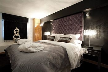 Imagen de la habitación del Hotel Posh Pads At The Casartelli. Foto 10