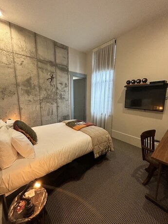 Imagen de la habitación del Hotel Poshtel. Foto 20