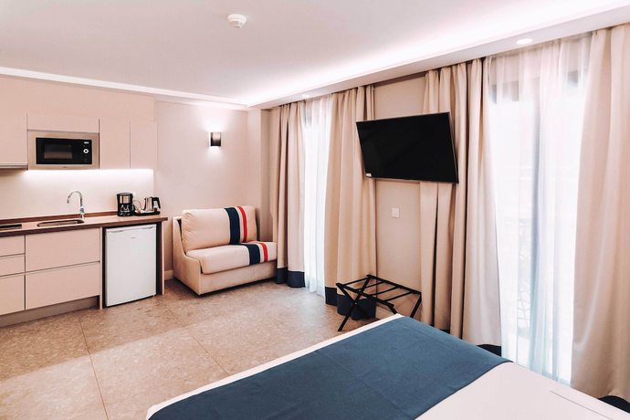 Imagen de la habitación del Hotel Posidonia Aparthotel. Foto 11