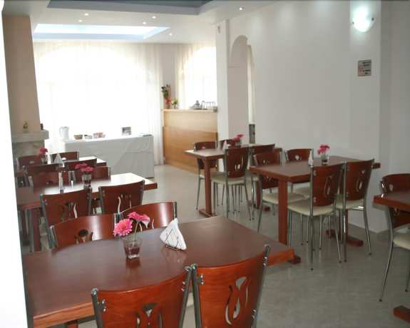 Imagen del bar/restaurante del Hotel Posidonia Pension. Foto 6