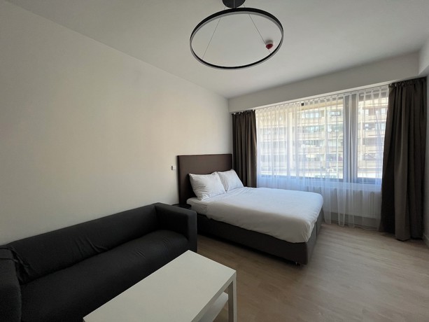 Imagen de la habitación del Hotel Post 120 Suites. Foto 10