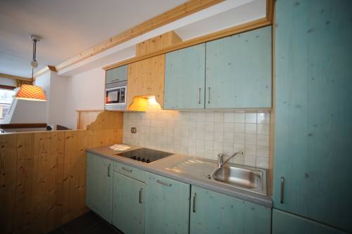 Imagen de la habitación del Hotel Post Alpina - Family Mountain Chalets. Foto 6