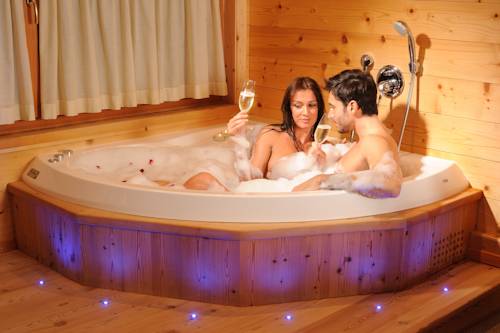 Imagen de la habitación del Hotel Post Alpina - Family Mountain Chalets. Foto 15