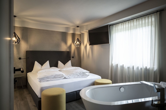 Imagen de la habitación del Hotel Post Alpina - Family Mountain Chalets. Foto 5