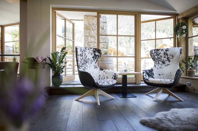 Imagen de los interiores del Hotel Post Alpina - Family Mountain Chalets. Foto 19