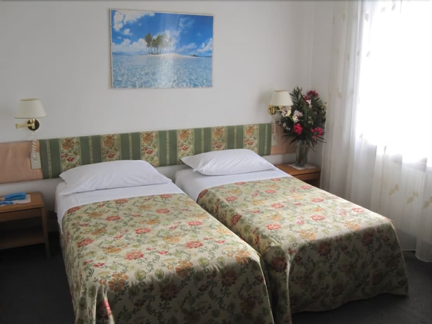 Imagen de la habitación del Hotel Post, Bergamo. Foto 6