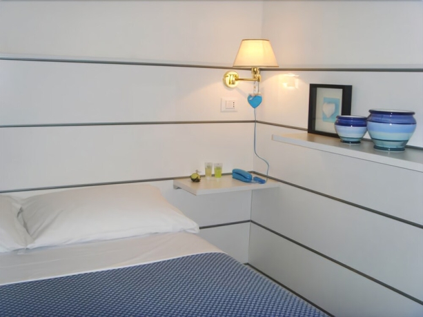 Imagen de la habitación del Hotel Post, Bergamo. Foto 9