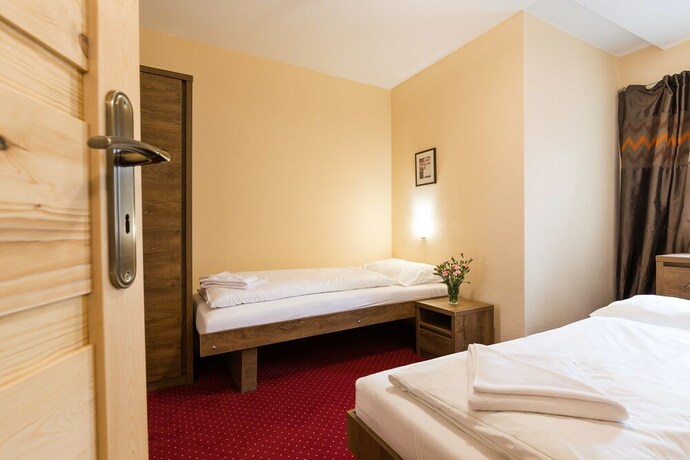 Imagen de la habitación del Hotel Post Fusch. Foto 13