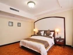 Imagen de la habitación del Hotel Post, Harbin. Foto 3