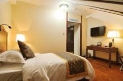 Imagen de la habitación del Hotel Post, Harbin. Foto 5