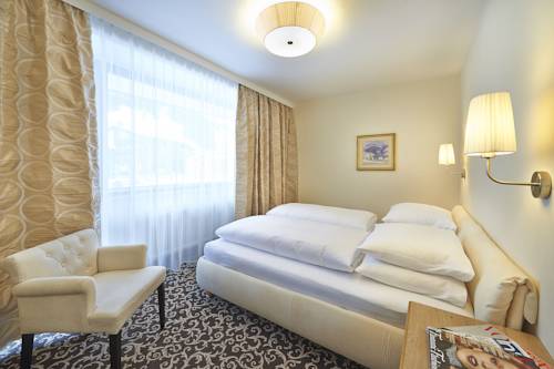 Imagen de la habitación del Hotel Post, Saalbach-Hinterglemm . Foto 9