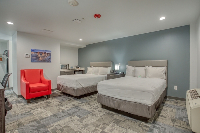 Imagen de la habitación del Hotel Post Time Inn. Foto 4