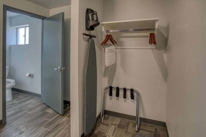 Imagen de la habitación del Hotel Post Time Inn. Foto 10