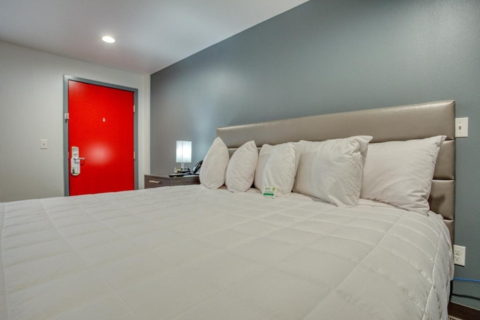 Imagen de la habitación del Hotel Post Time Inn. Foto 12