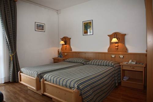 Imagen de la habitación del Hotel Posta, Forni di Sopra . Foto 2