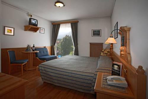 Imagen de la habitación del Hotel Posta, Forni di Sopra . Foto 12
