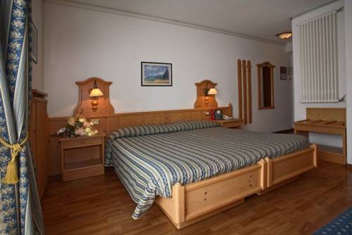Imagen de la habitación del Hotel Posta, Forni di Sopra . Foto 15