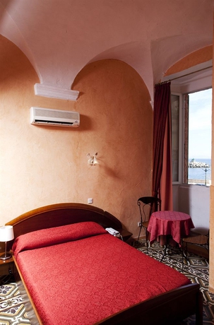 Imagen de la habitación del Hotel Posta Vecchia. Foto 1
