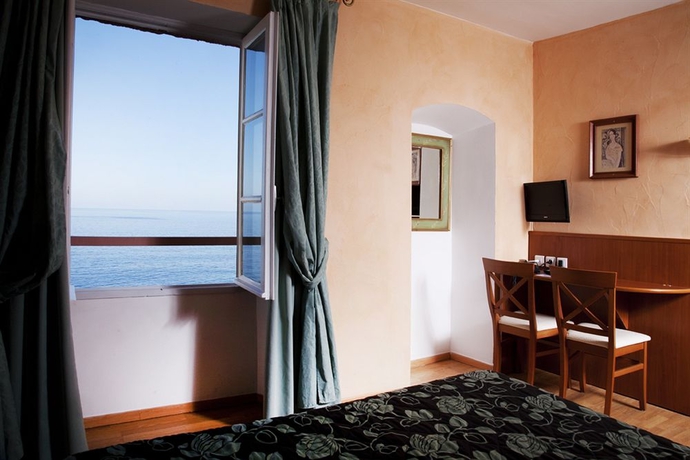 Imagen de la habitación del Hotel Posta Vecchia. Foto 6