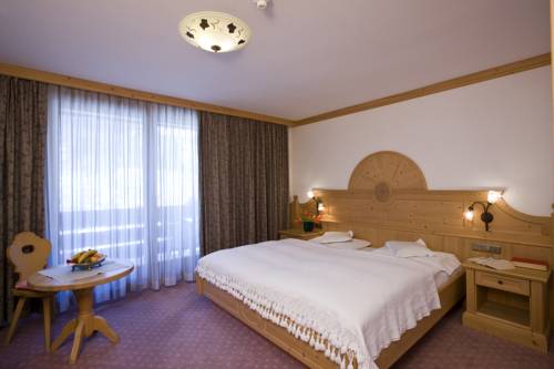 Imagen de la habitación del Hotel Posta Zirm. Foto 7