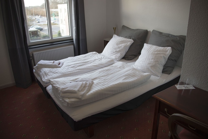Imagen de la habitación del Hotel Postgaarden. Foto 6