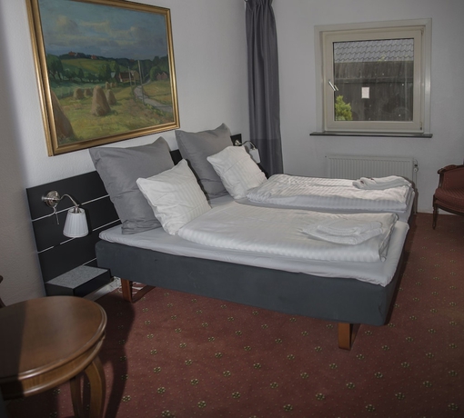 Imagen de la habitación del Hotel Postgaarden. Foto 12