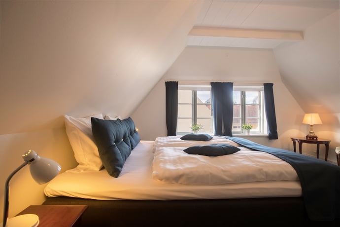 Imagen de la habitación del Hotel Postgaarden Mariager. Foto 13