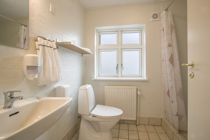 Imagen de la habitación del Hotel Postgaarden Mariager. Foto 19