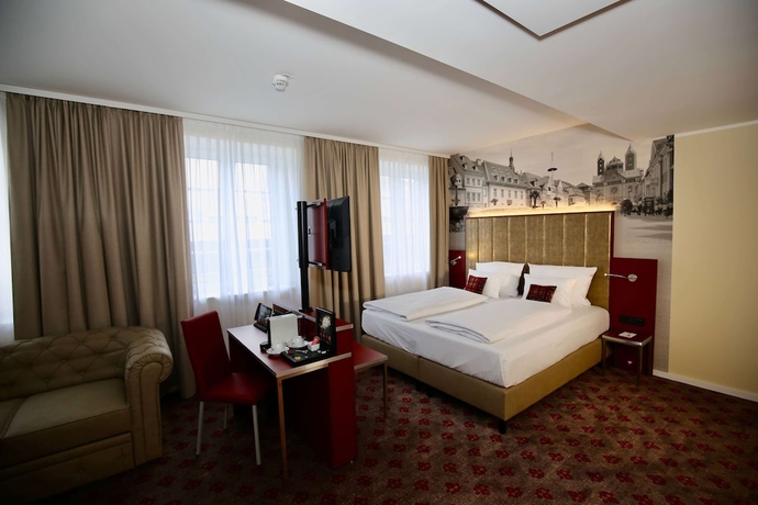 Imagen de la habitación del Hotel Postgalerie Speyer. Foto 6