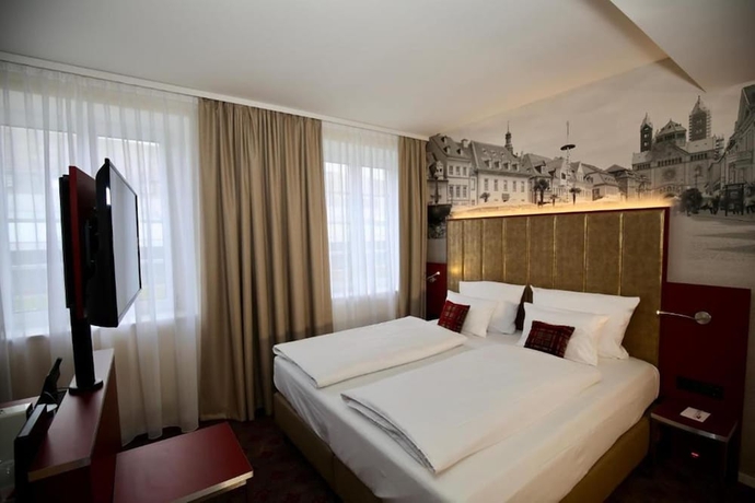 Imagen de la habitación del Hotel Postgalerie Speyer. Foto 7