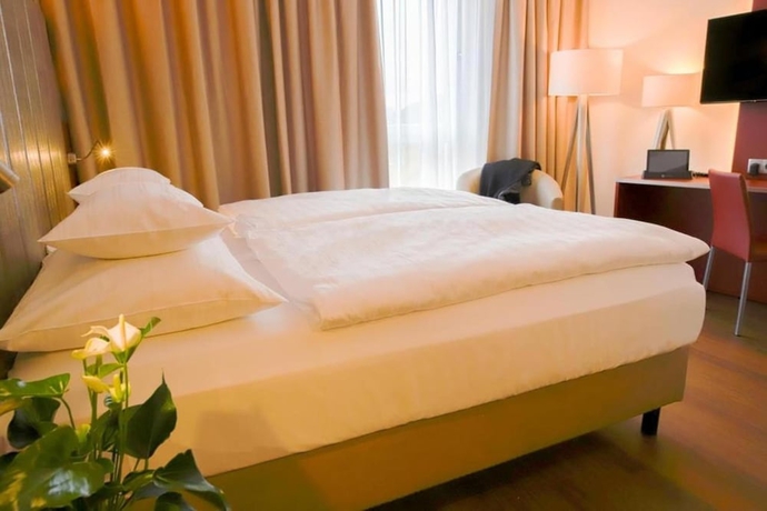 Imagen de la habitación del Hotel Postgalerie Speyer. Foto 11