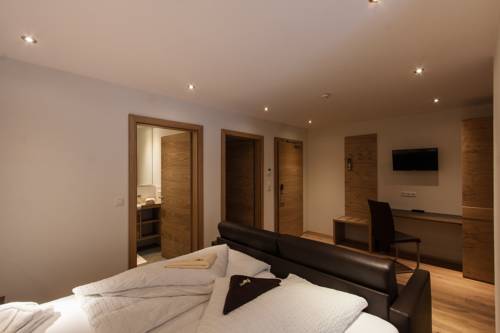 Imagen de la habitación del Hotel Posthotel Pfunds. Foto 4