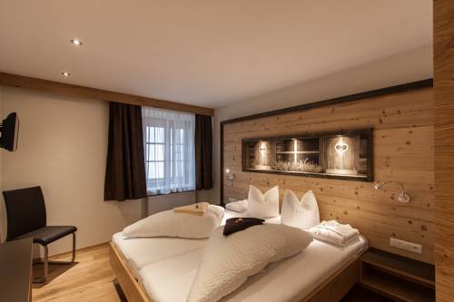 Imagen de la habitación del Hotel Posthotel Pfunds. Foto 6
