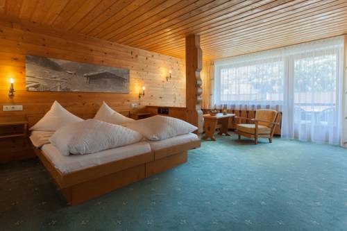 Imagen de la habitación del Hotel Posthotel Pfunds. Foto 9