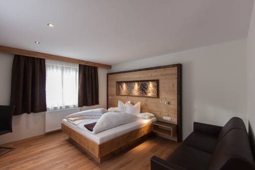 Imagen de la habitación del Hotel Posthotel Pfunds. Foto 10