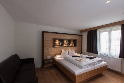 Imagen de la habitación del Hotel Posthotel Pfunds. Foto 14