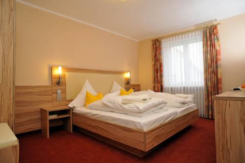 Imagen de la habitación del Hotel Posthotel Traube. Foto 12