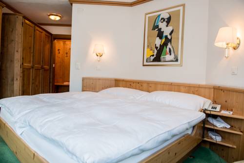 Imagen de la habitación del Hotel Posthotel Valbella. Foto 4