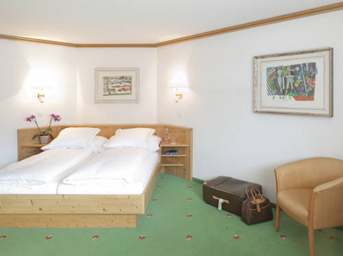 Imagen de la habitación del Hotel Posthotel Valbella. Foto 11