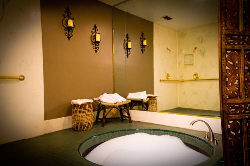 Imagen de la habitación del Hotel Postmarc and Spa Suites. Foto 5