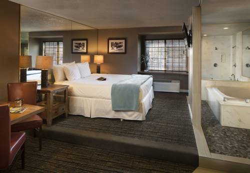 Imagen de la habitación del Hotel Postmarc and Spa Suites. Foto 13