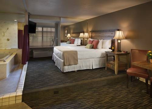 Imagen de la habitación del Hotel Postmarc and Spa Suites. Foto 16